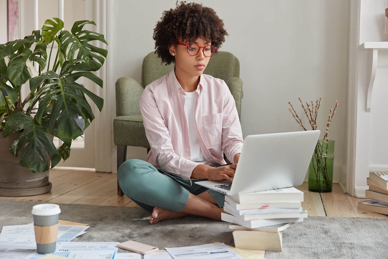 black-businesswoman-keyboards-on-laptop-computer-RXTPFFR.jpg